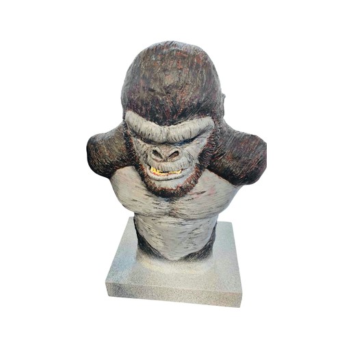 39 - A large painted sculptural bust of a King Kong gorilla, modelled with exaggerated shoulders and bare... 