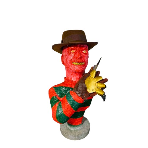 45 - A contemporary painted bust Freddy Krueger model of a horror character, in red and green striped swe... 