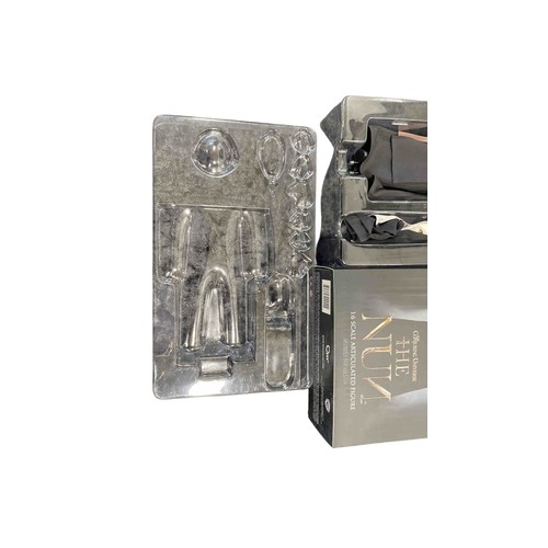 19 - A boxed 1:6 scale articulated horror figure from The Conjuring Universe: The Nun, with interchangeab... 