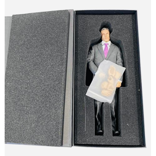 18 - A Kento Studio 1/6th scale hand-made collectible male figure in a pinstripe suit with purple tie, pr... 