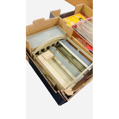 51 - A group of vintage Trix model railway items, including passenger coaches, goods wagons, controllers ... 