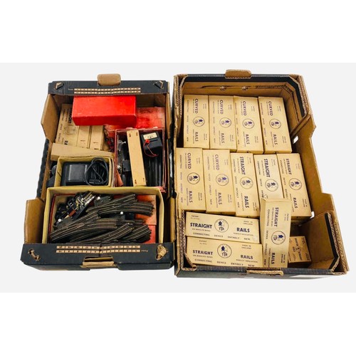 52 - A group of Tri-ang model railway accessories, including TTR straight and curved rails in original bo... 