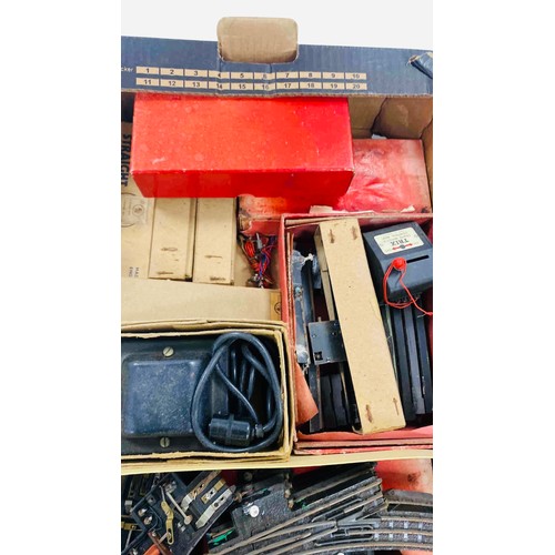 52 - A group of Tri-ang model railway accessories, including TTR straight and curved rails in original bo... 