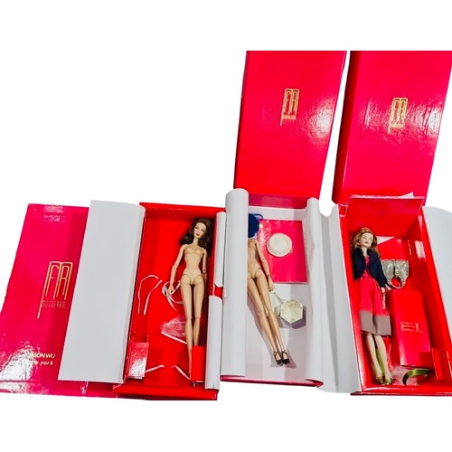 33 - A group of FR Monogram fashion dolls, including nude articulated figures and a dressed example, pres... 