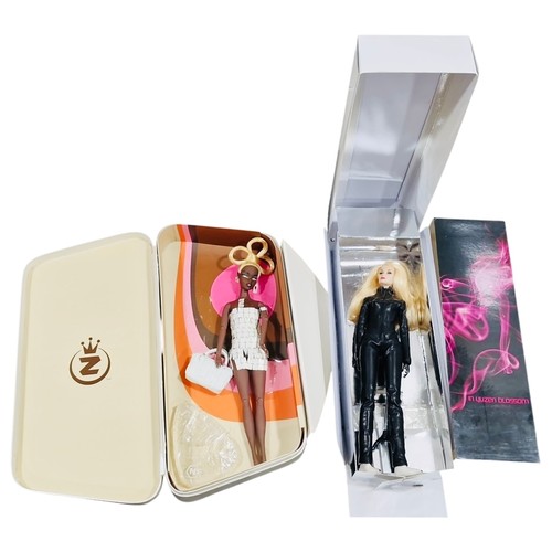 32 - 2 boxed fashion Integrity dolls, each with accessories; one dark-skinned doll Monsieur Z Fashion Roy... 