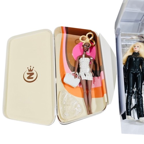 32 - 2 boxed fashion Integrity dolls, each with accessories; one dark-skinned doll Monsieur Z Fashion Roy... 
