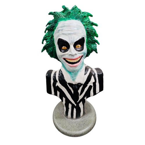 42 - A painted bust model of a Beetlejuice, green-haired character in black-and-white striped suit, mount... 
