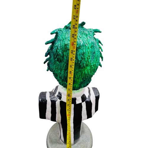 42 - A painted bust model of a Beetlejuice, green-haired character in black-and-white striped suit, mount... 