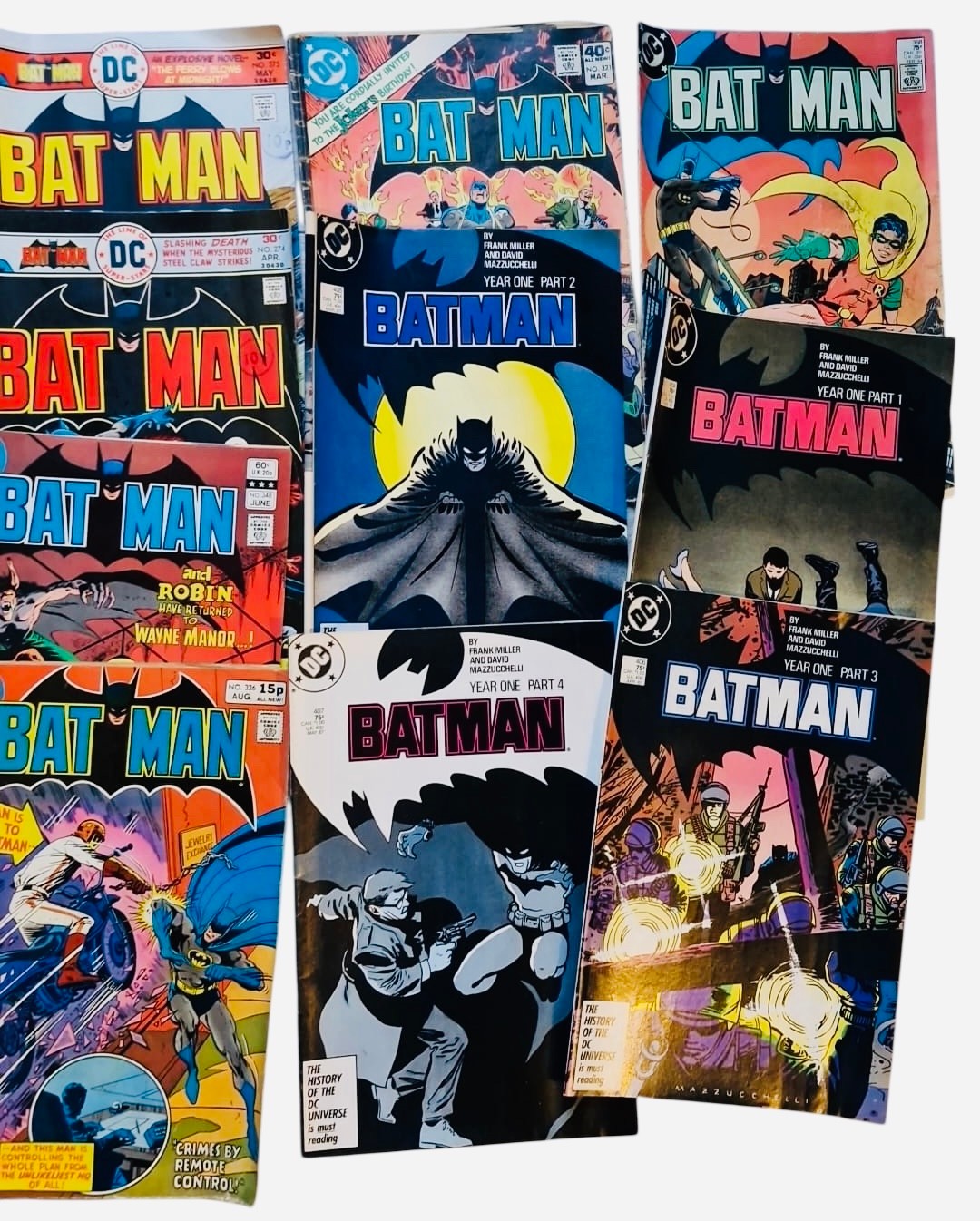 A group of DC Comics Batman issues, including Detective Comics and ...