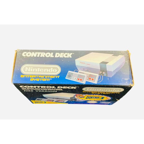 A Nintendo Entertainment System (NES) Control Deck console in its ...