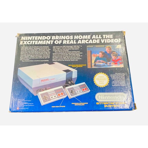 A Nintendo Entertainment System (NES) Control Deck console in its ...