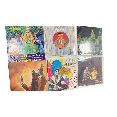 A group of Indian vinyl LP records in illustrated sleeves, including ...