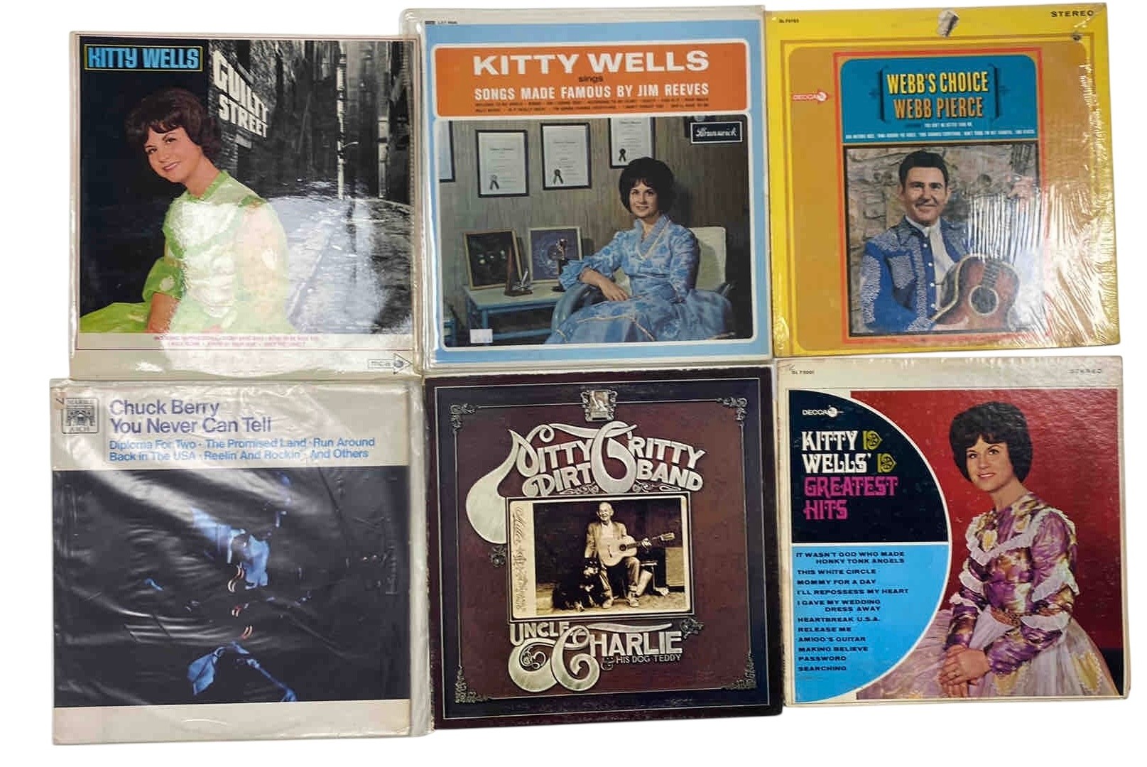 A group of vintage vinyl records, including Kitty Wells albums and a ...