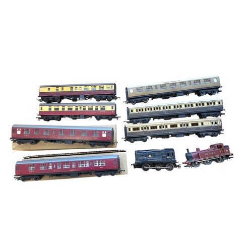 69 - A collection of mainly Hornby model railway rolling stock and locomotives, including maroon-and-grey... 