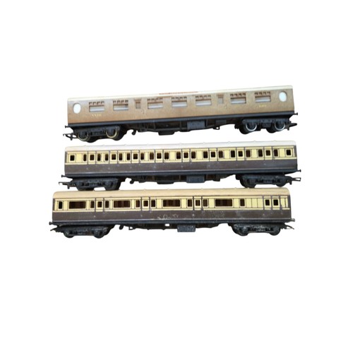 69 - A collection of mainly Hornby model railway rolling stock and locomotives, including maroon-and-grey... 