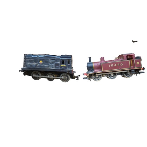 69 - A collection of mainly Hornby model railway rolling stock and locomotives, including maroon-and-grey... 