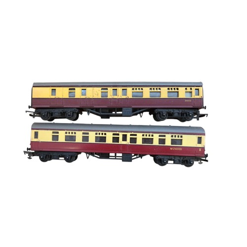 69 - A collection of mainly Hornby model railway rolling stock and locomotives, including maroon-and-grey... 
