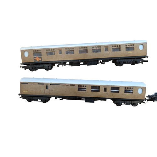 70 - A group of vintage mainly Hornby model railway rolling stock, including passenger coaches in maroon ... 