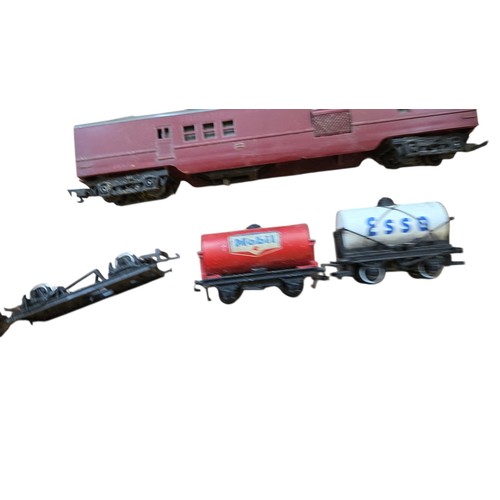 70 - A group of vintage mainly Hornby model railway rolling stock, including passenger coaches in maroon ... 