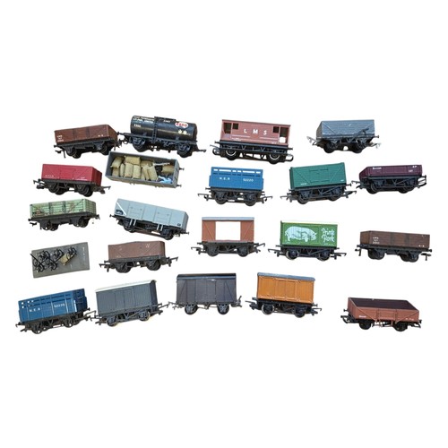 71 - A group of mainly Hornby OO-gauge model railway rolling stock, including open and covered goods wago... 
