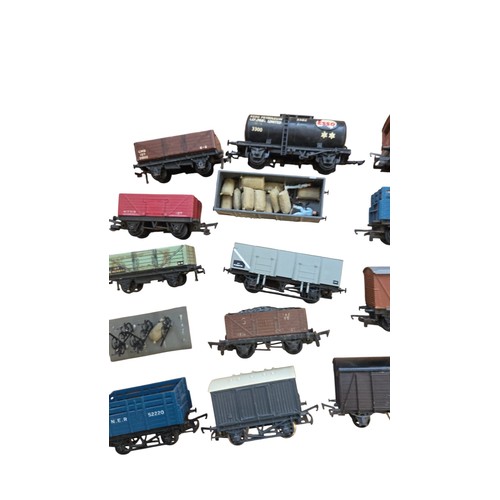 71 - A group of mainly Hornby OO-gauge model railway rolling stock, including open and covered goods wago... 