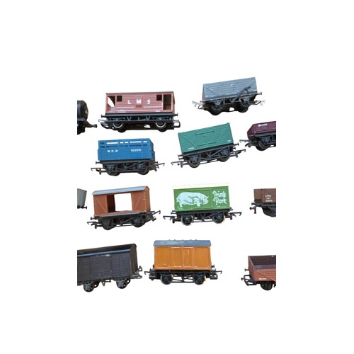 71 - A group of mainly Hornby OO-gauge model railway rolling stock, including open and covered goods wago... 