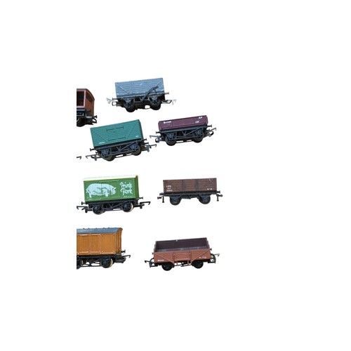 71 - A group of mainly Hornby OO-gauge model railway rolling stock, including open and covered goods wago... 