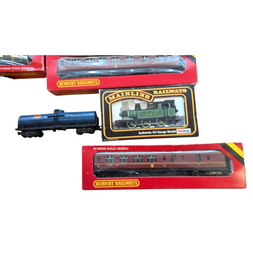 74 - A group of OO gauge model railway items, largely Hornby Railways, including boxed LMS Coach Composit... 