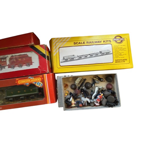 75 - A group of model railway items including Hornby Railways rolling stock and a green LNER locomotive n... 