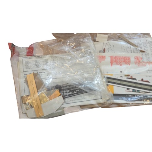 78 - A group of Tri-ang Hornby O gauge model railway components, including locomotive bodies, wagons, tra... 