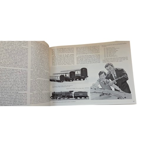 83 - A group of illustrated reference books on model railways, including Michael Foster's Hornby Dublo Tr... 