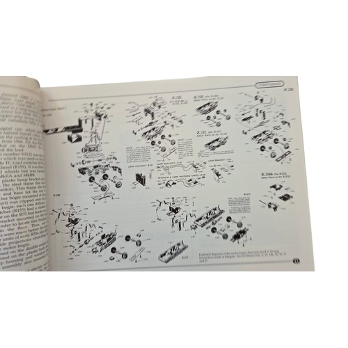 83 - A group of illustrated reference books on model railways, including Michael Foster's Hornby Dublo Tr... 