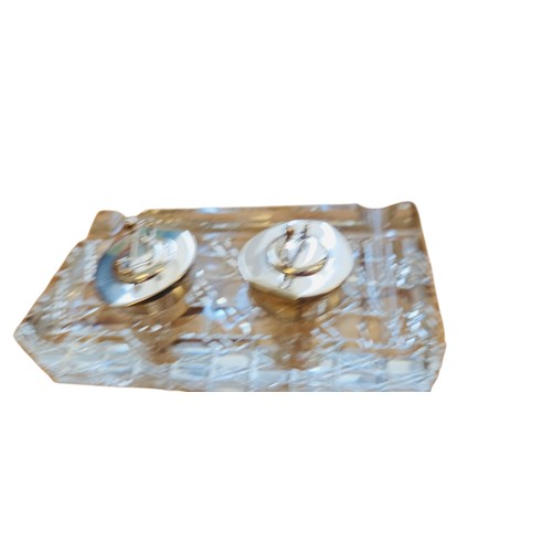 56 - A group comprising a sterling silver photograph frame and a cut-glass double inkwell, the latter wit... 