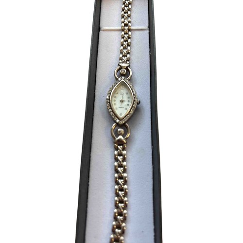 44 - Silver lady's wristwatch with marquise dial, quartz movement, paste-set surround, and fancy-link bra... 