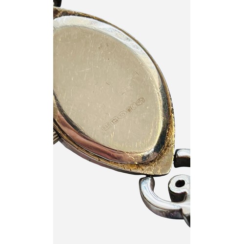 44 - Silver lady's wristwatch with marquise dial, quartz movement, paste-set surround, and fancy-link bra... 
