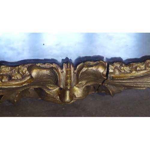 301 - A Victorian carved wood gilded frame Italian Viennese wall mirror surmounted by a cherub - 93cm x 54... 