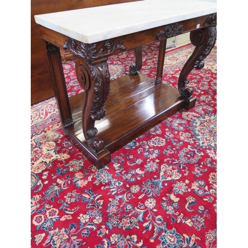 298 - A very fine Regency rosewood console table with a marble top in the manner of Gillows in good condit... 