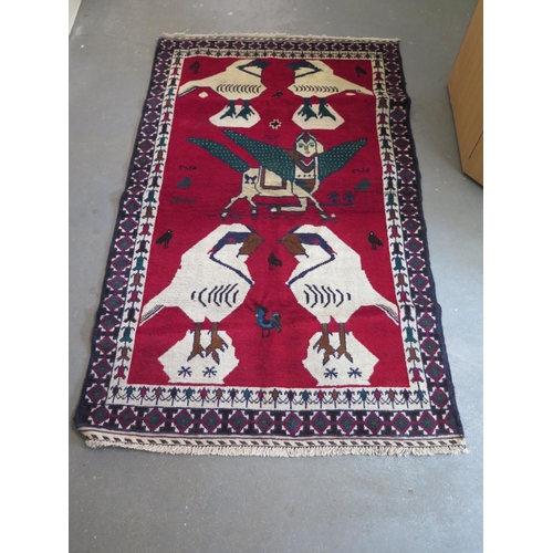 424 - A Tribal Pictorial rug - 88cm x 141cm