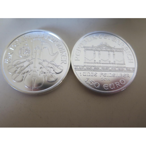 1107 - Twenty mint .999 silver 1oz Philharmoniker 2014 Austria 50 Euro coins held within a plastic tube, al... 