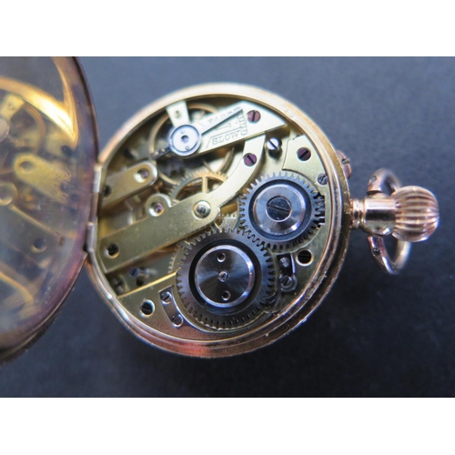 1067 - A 14ct yellow gold cased open faced ladies pocket watch, engraved brass dial with Roman numerals, ma... 