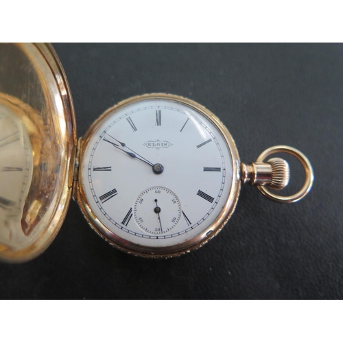 1068 - A 14ct yellow gold cased pocket watch - full Hunter, white enamel dial with Roman numerals, subsidia... 