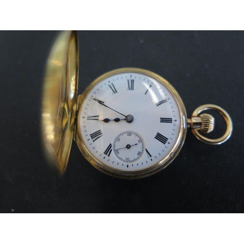 1071 - An 18ct yellow gold half Hunter ladies pocket watch, Roman numerals to white enamel dial subsidiary ... 