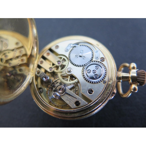 1074 - An 18ct yellow gold cased open faced ladies pocket watch with Arabic numerals to enamel dial - the b... 