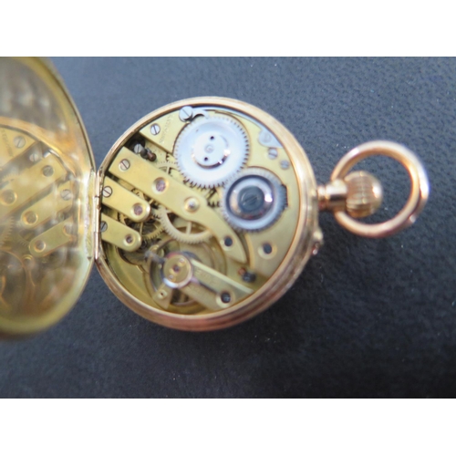 1075 - A 15ct yellow gold cased open faced ladies pocket watch, Roman numerals to white enamel dial, subsid... 