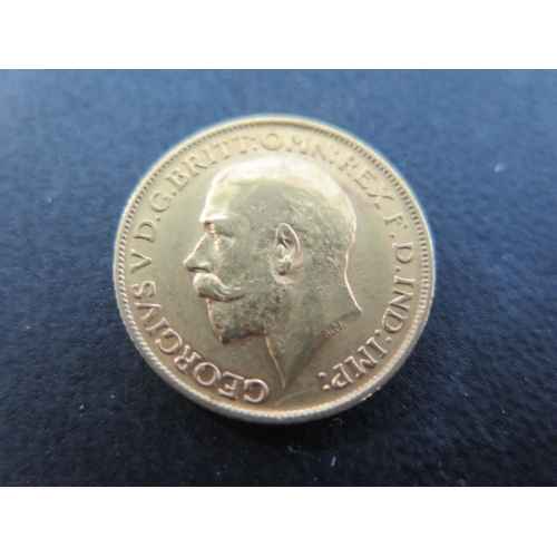 1103 - A George V full Sovereign dated 1911 - condition slightly dull, otherwise in good condition