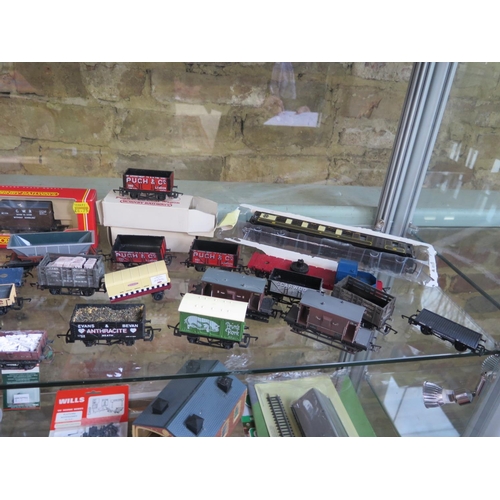 1154 - A collection of OO gauge railway including three boxed Bachmann locos and assorted rolling stock and... 