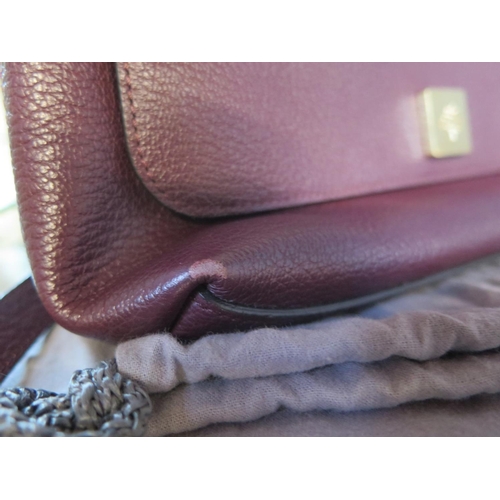 1200 - A Mulberry maroon leather shoulder bag with fold over top and magnetic catch box, cover and bag - 20... 