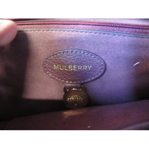 1200 - A Mulberry maroon leather shoulder bag with fold over top and magnetic catch box, cover and bag - 20... 