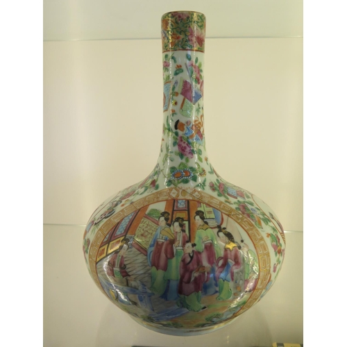 1213 - A Famille Rose bottle vase - Height 30cm - cracks running through body and top but no obvious repair... 