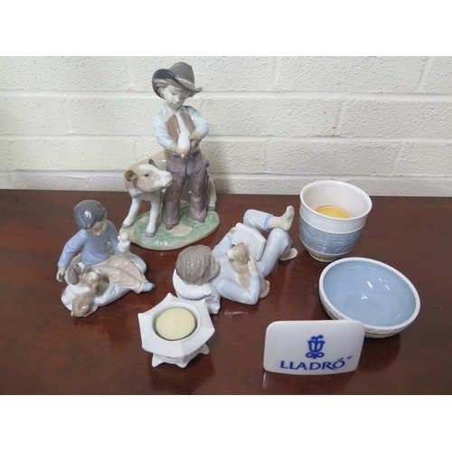 1226 - A group of Lladro figures and items including 8607 Cowboy with Calf, 6985 Boy with Puppet and Puppie... 